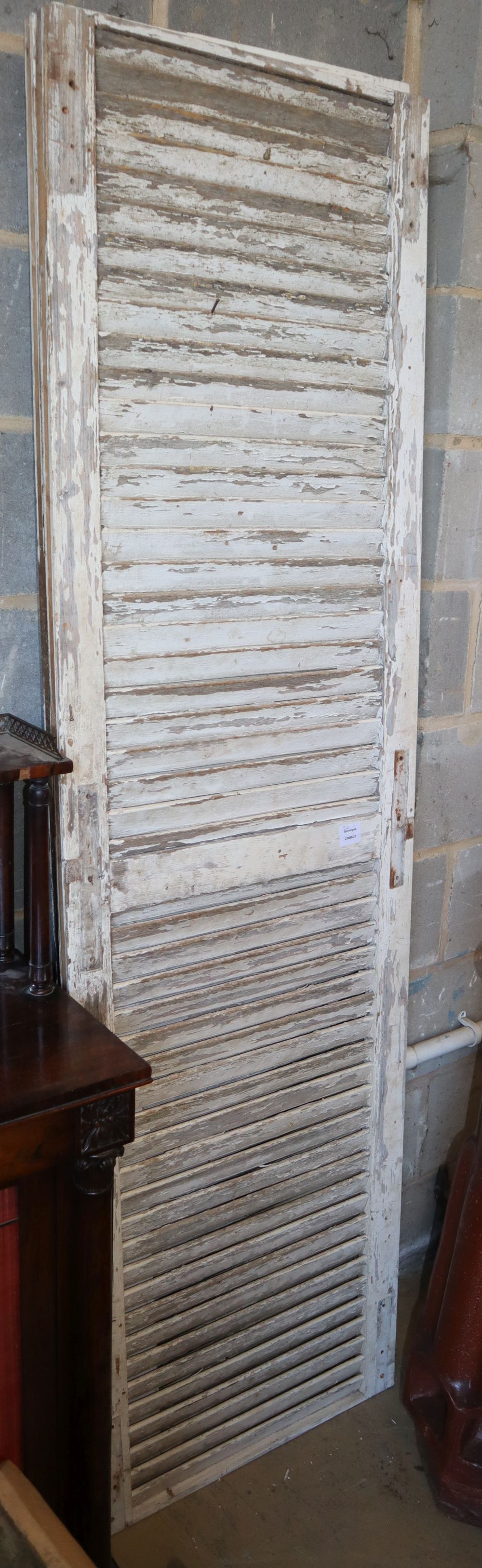 A set of four French original painted louvres shutters, c.1840, W.59cm, H.210cm